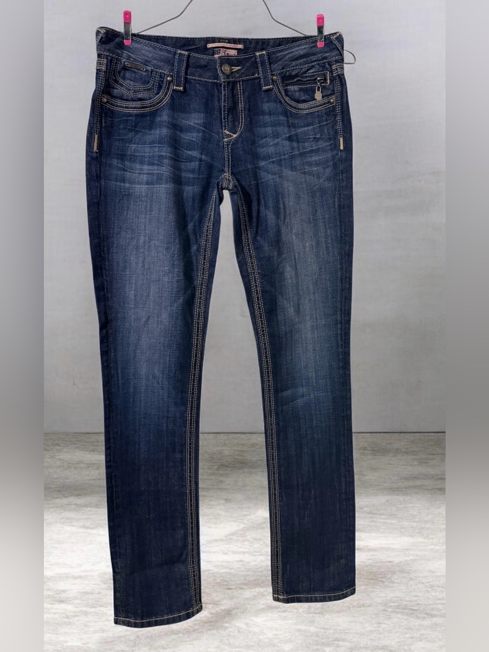 Vintage BeRock for Express Dark wash jeans with a low-rise fit.
